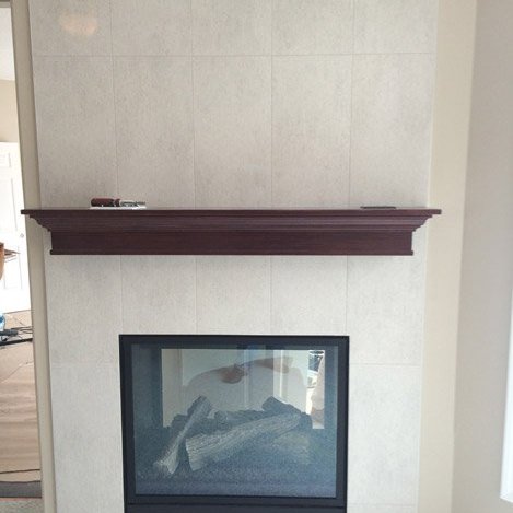fireplace mantle tile installation - Contract Interiors, IN